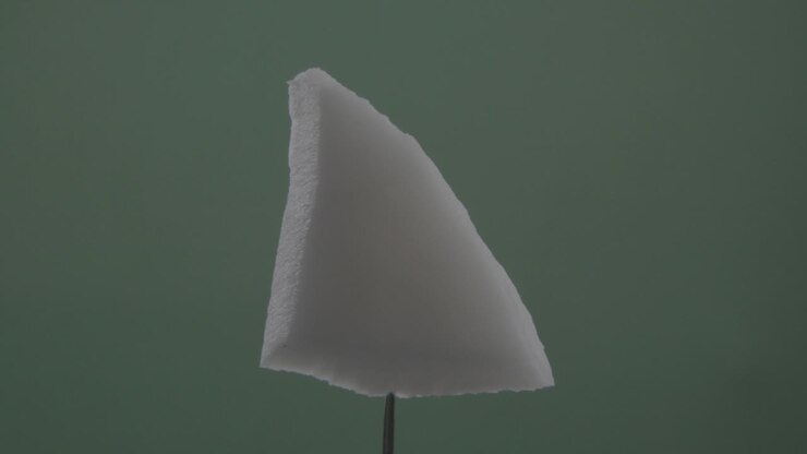 Coconut rotating with loop on green screen for chroma key