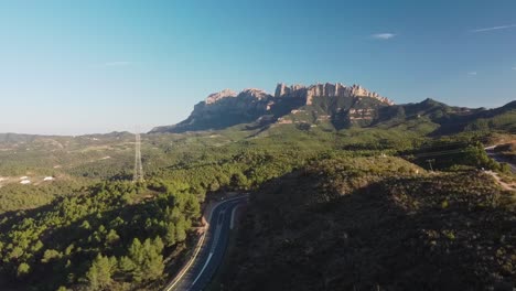 montserrat mountain range in marganell, spain on a sunny day, aerial view