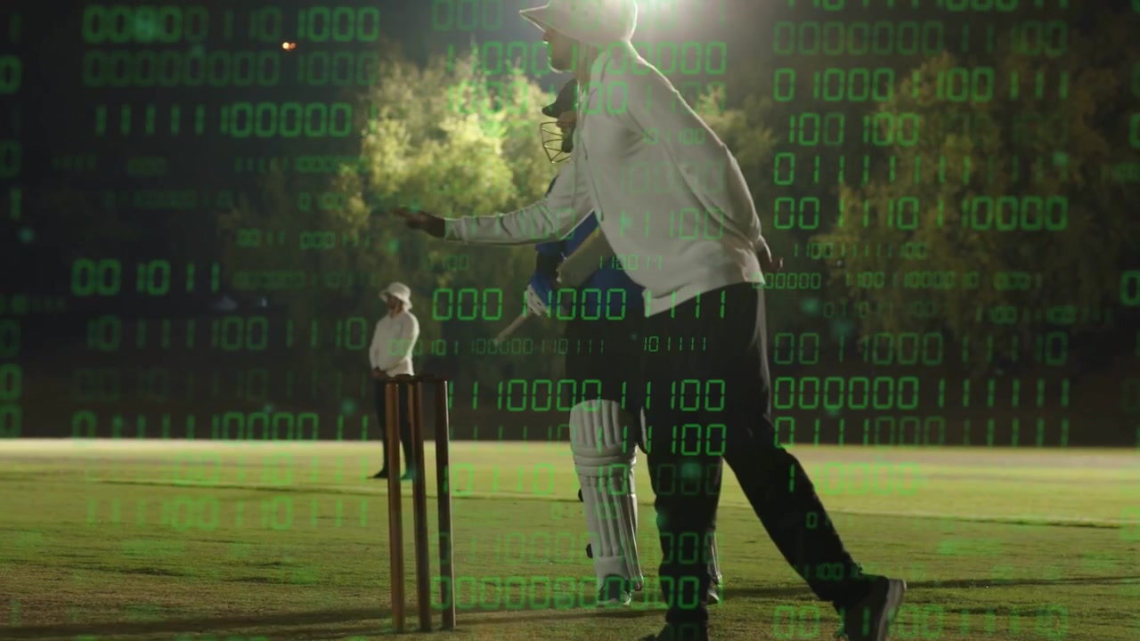Batsman running between stumps on ball, practicing runs floodlit, green binary overlay guiding