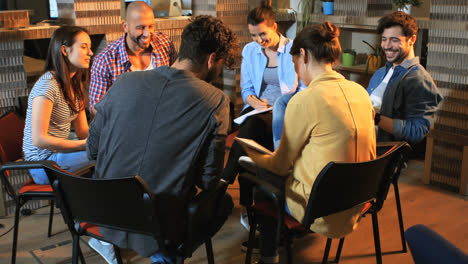 Group-of-business-executive-having-a-discussion