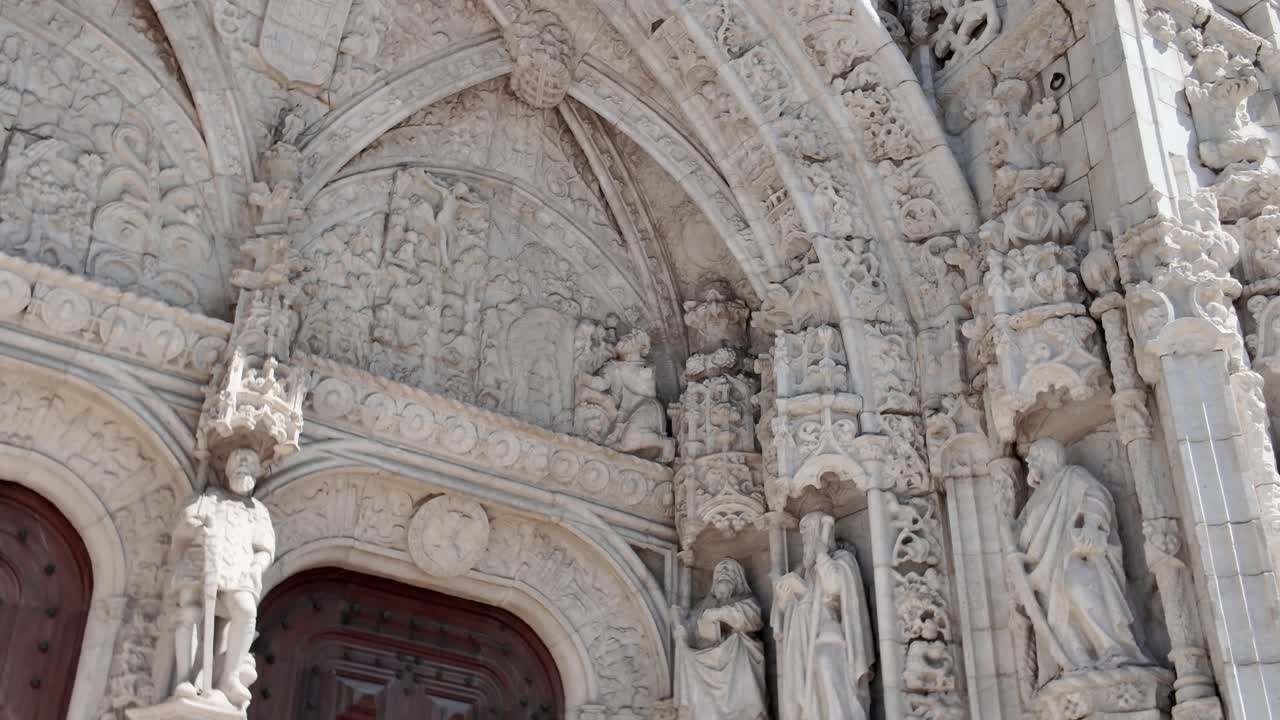 Detailed Manueline architecture of Jerónimos Monastery entrance in Lisbon Portugal