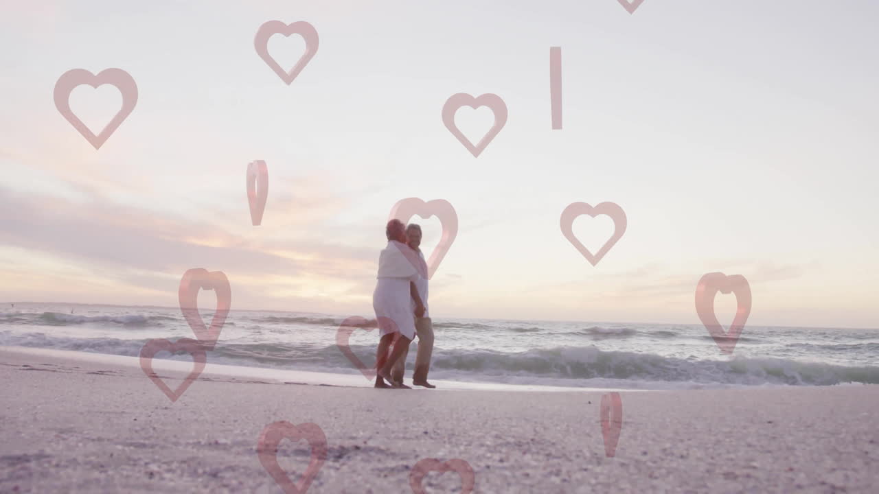 Walking on beach, elderly couple surrounded by heart shapes in animation