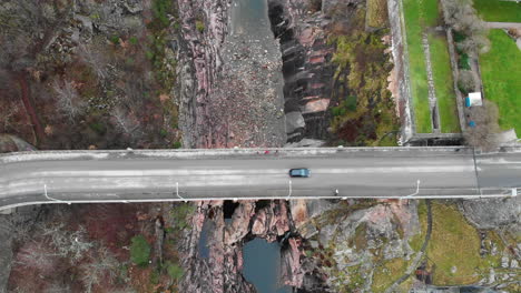 aerial bird eye view of vehicle driving on oskarsbron oskar bridge over trollhättan trollhattan waterfalls sweden