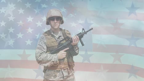 animation of male soldier holding machine gun moving over american flag