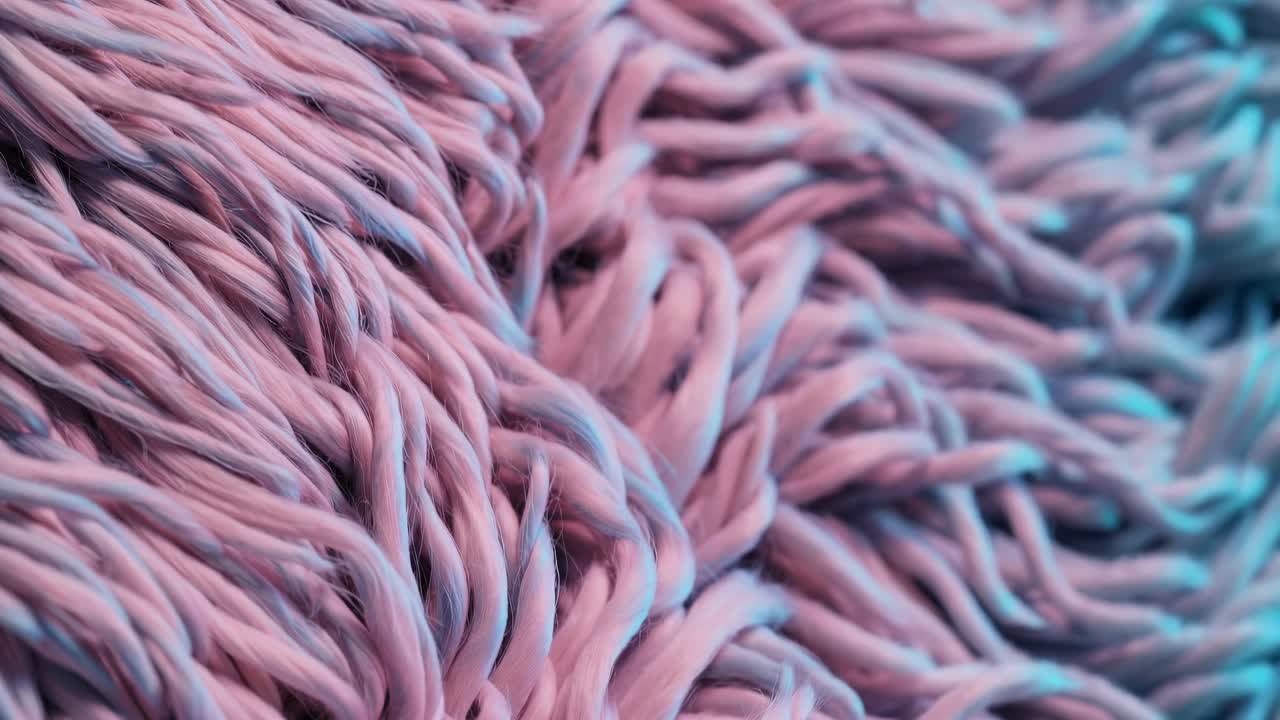 Close-up view of vibrant pink and purple hair textures