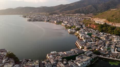 village and lake in shuanglang, yunnan, china.