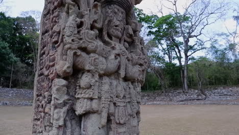 Tilt-down-ornate-carved-stele-stone-at-Copan-Mayan-ruins-in-Honduras
