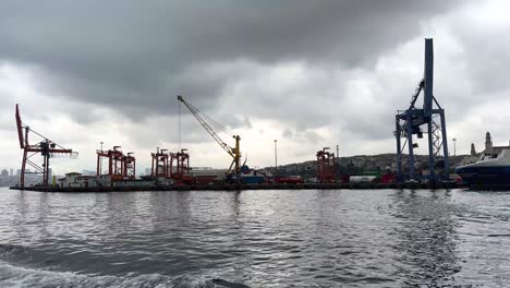 industrial platform with cranes near bosphorus waterfront