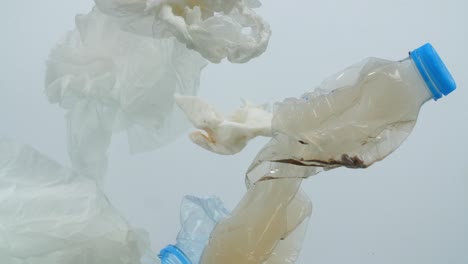 underwater footage of plastic pollution problem concept in ocean