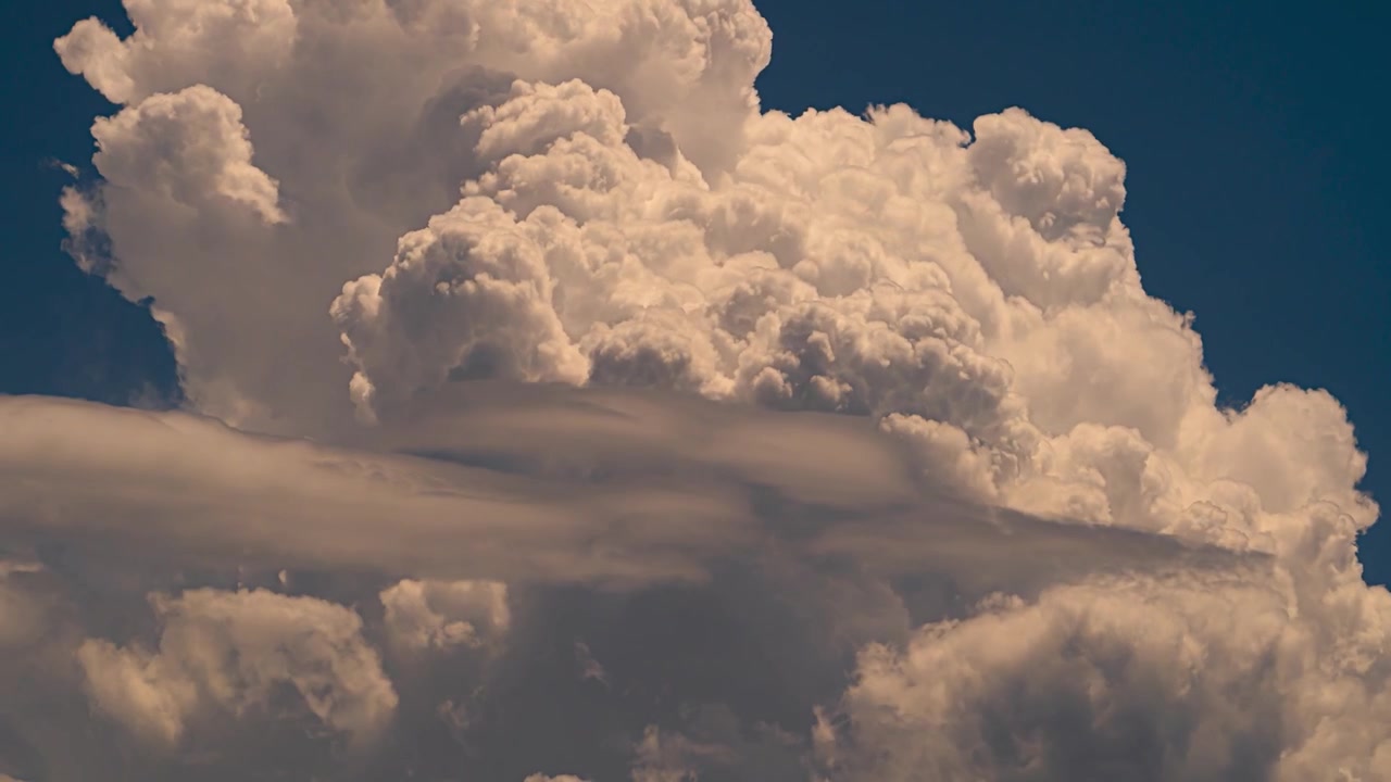 Time lapse of Cumulus Clouds building in the afternoon over Big Bear Lake and Mount San Gorgonio California, in the San Bernardino National Forest, filmed from Lake Arrowhead California.