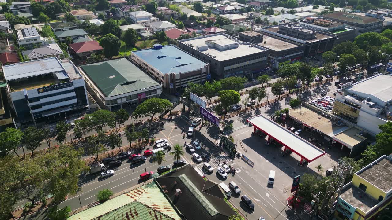 Road Crossing Through Commercial Establishments In Greenhills Center, San Juan City, Philippines. Aerial Drone Shot