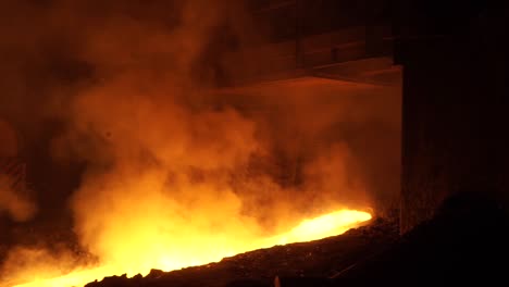 molten metal pouring in a steel mill