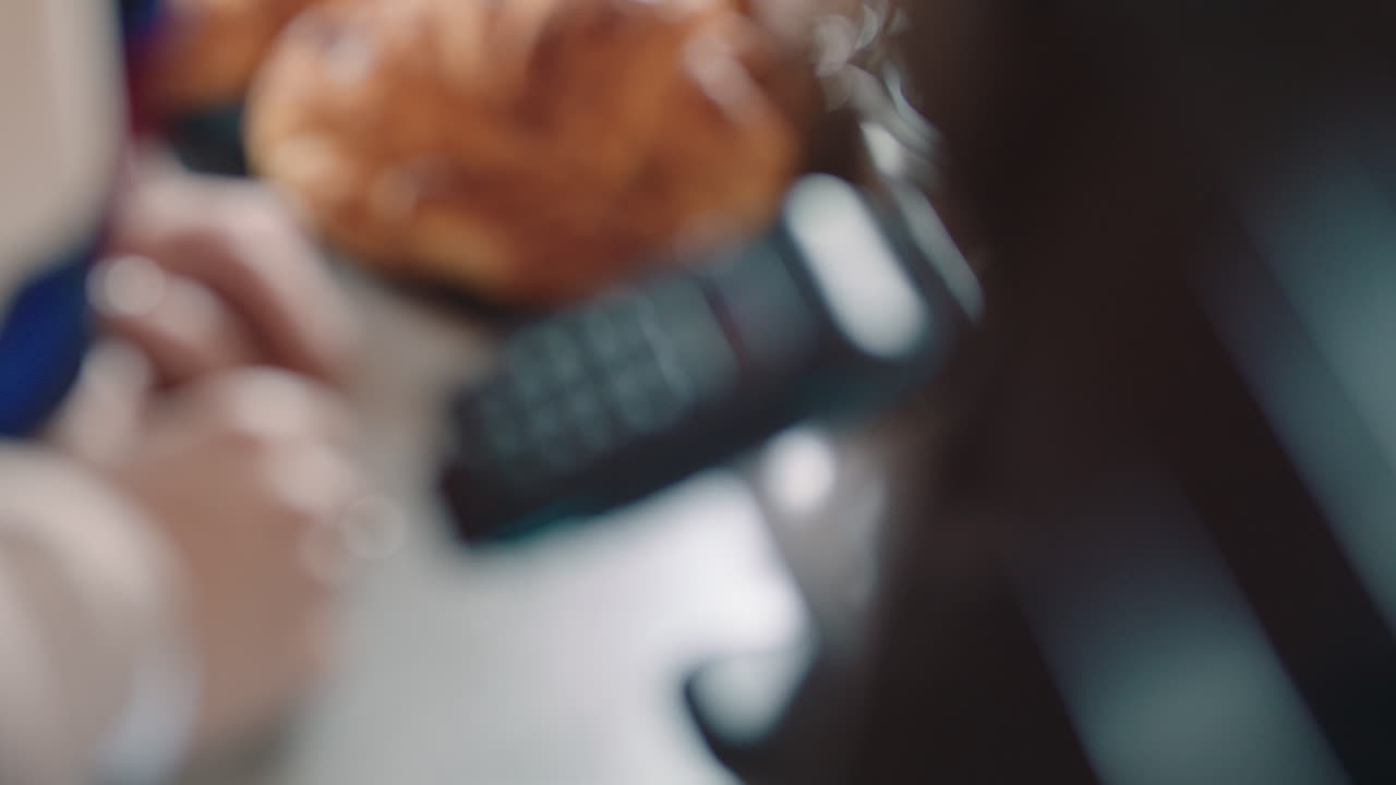 close up customer paying using credit card contactless payment in cafe spending money with wireless transaction in restaurant coffee shop