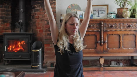 woman doing yoga indoors