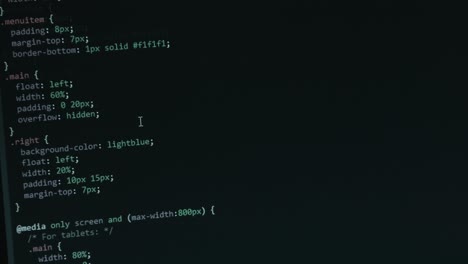 Code-Programming-Screen-with-Different-Colours-being-Navigated-by-Scrolling-with-Close-Up-Pixel-Details-HTML---Focus-Pull-Footage-4K