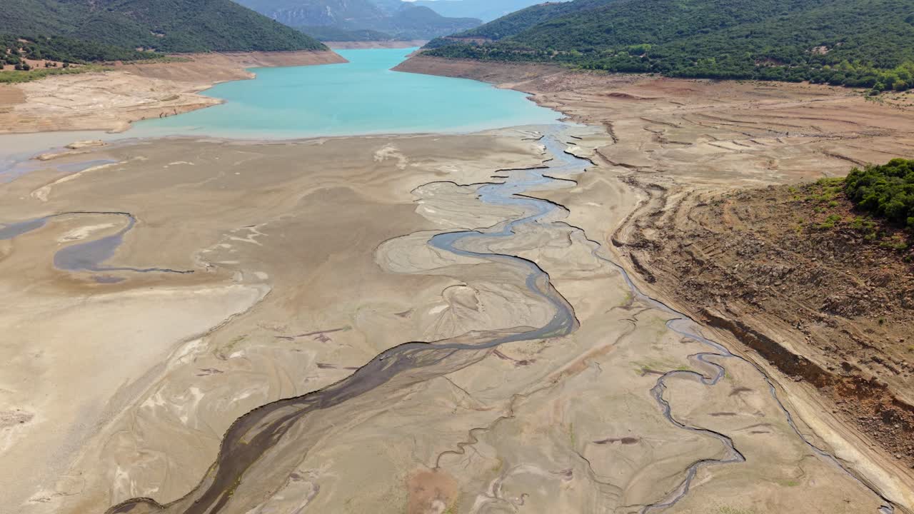 Cracked dry river delta branches outward in intricate natural patterns in Greece terrain