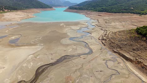 cracked dry river delta branches outward in intricate natural patterns in greece terrain