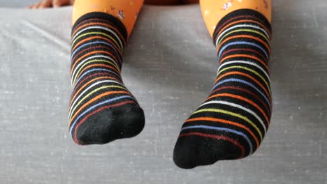 childrens socks on a couch