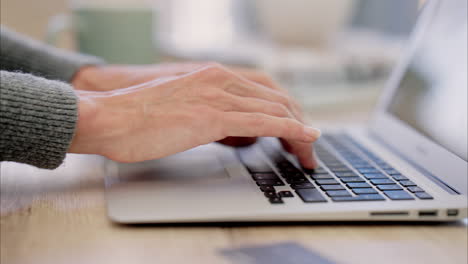 Woman-hands-typing-laptop-keyboard