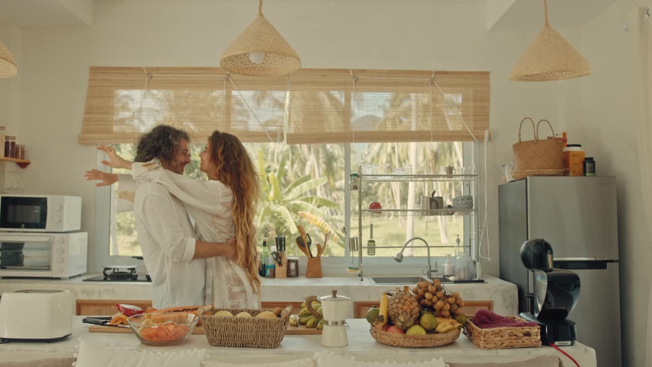 Couple Enjoying a Romantic Breakfast in a Tropical Kitchen