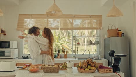 couple enjoying a romantic breakfast in a tropical kitchen