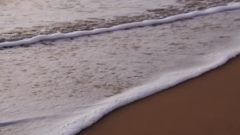 Port-Kembla-sea-foam-on-shoreline