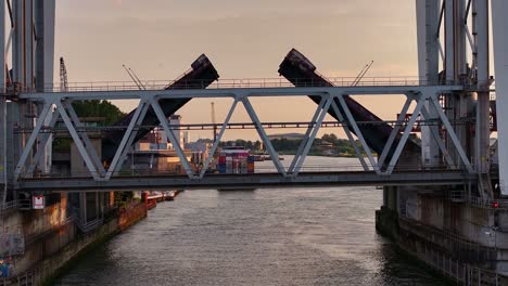 railway bridge in dordrecht lifting over the river to allow passing boats