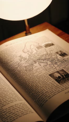 antique book with world map