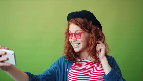 teenage girl taking a selfie