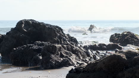 waves on rocky california el matador beach