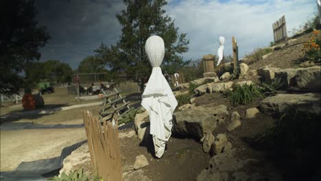 White-ghost-decorations-at-halloween-pumpkin-patch