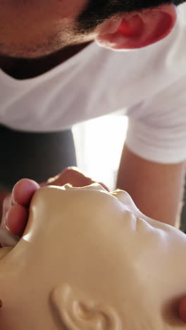 male paramedic during cardiopulmonary resuscitation training