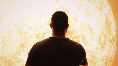 man reaching for the sun