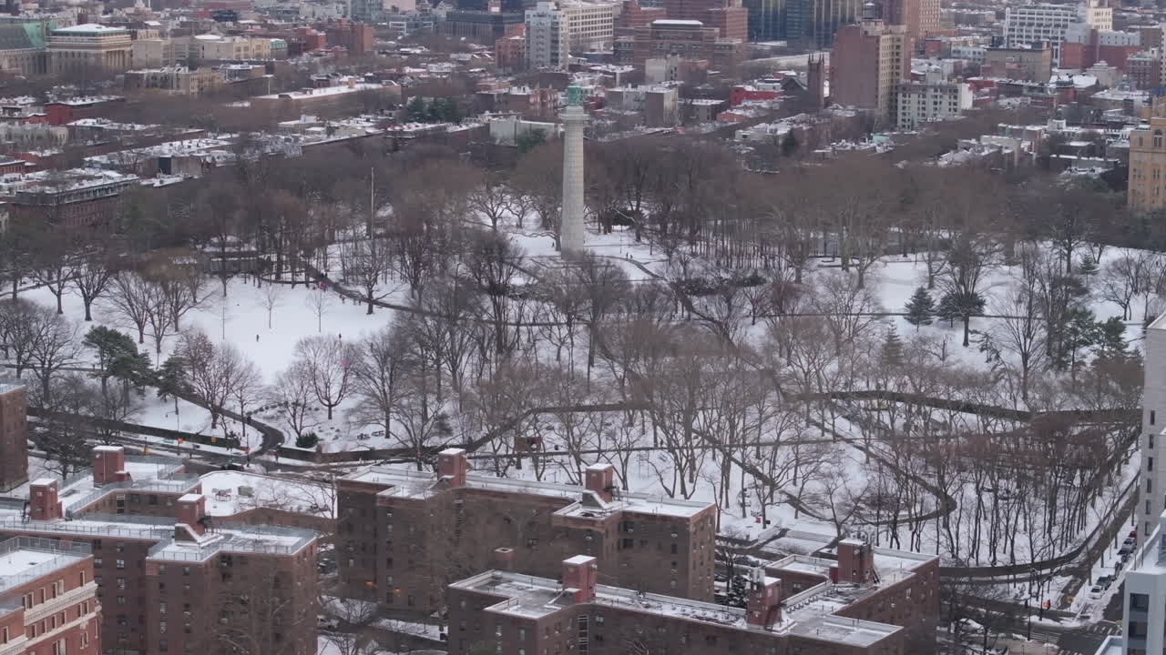 Aerial view of Brooklyn's Fort Greene Park and Prison Ship Martyrs Monument. Shot on an overcast winter day.