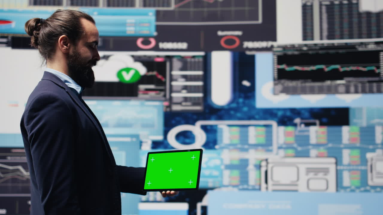 Male administrator uses green screen phone to explore new growth strategy