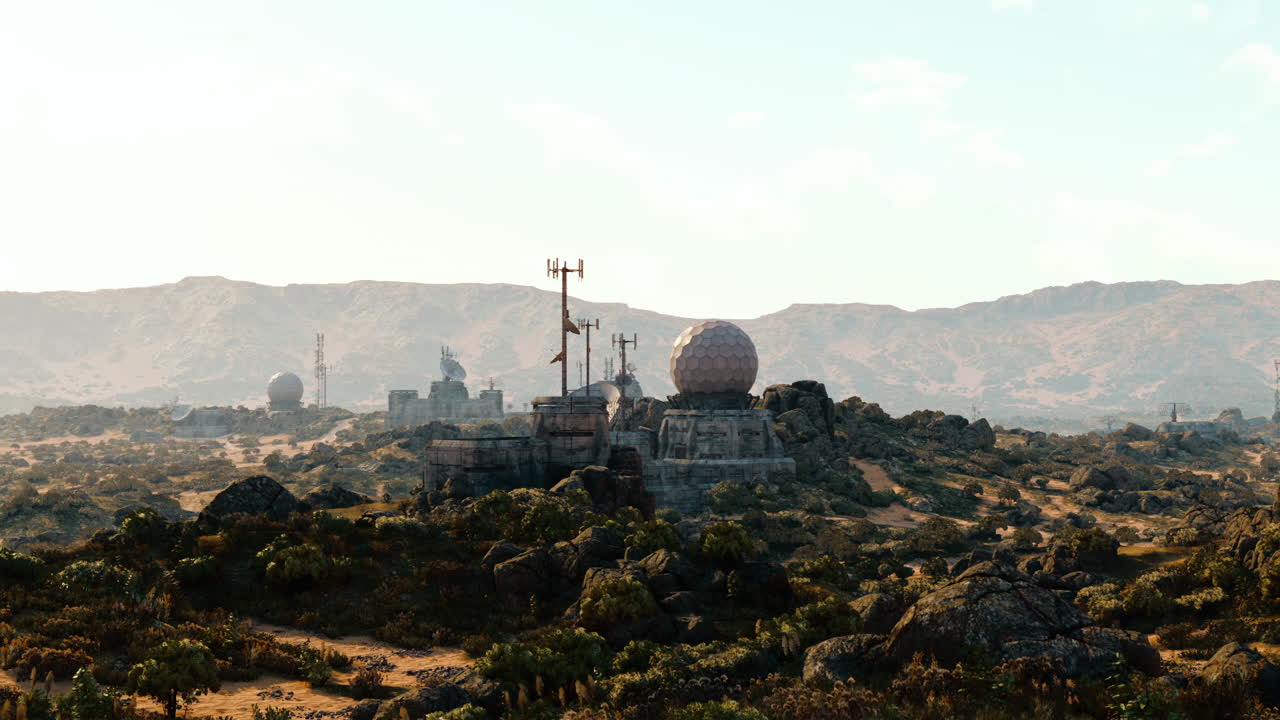 Military base nestled in mountainous terrain during daylight hours