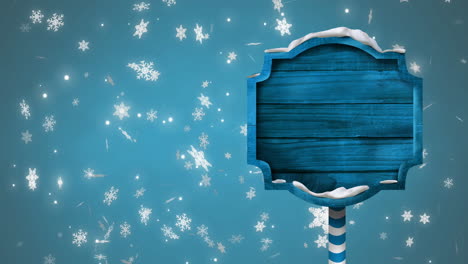 animation of christmas sign with copy space with glowing spots on blue background