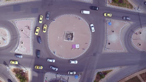 aerial straight down of traffic circle or roundabout with car traffic amman jordan