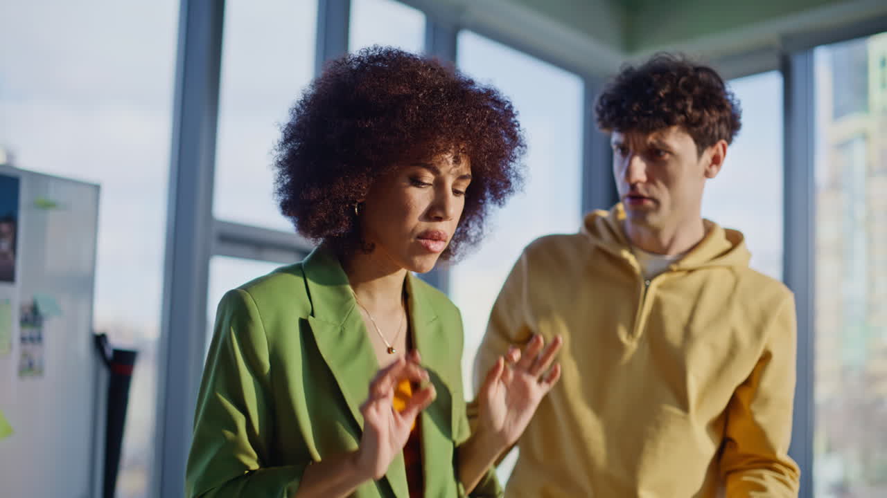 Concerned partners calling cellphone in office room closeup. Stressed woman