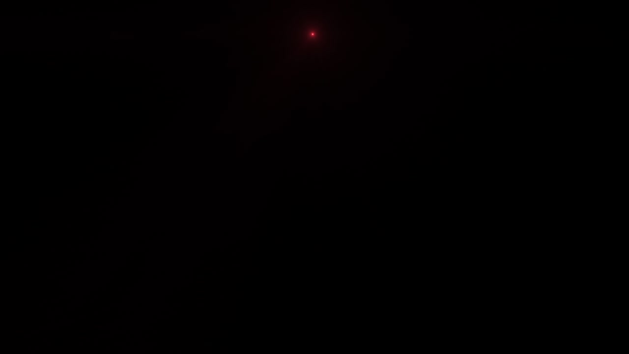 techy lente óptica roja flares transición que es un bucle sin costuras con iluminación roja anamórfica natural. 4k genial para gráficos en movimiento