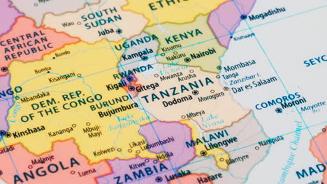 close-up of the country word tanzania on a world map with the detailed name of the capital city