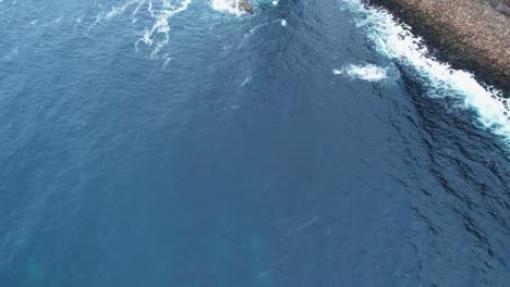 slow motion, reveal shot of the old man of hoy, a 449ft high sea stack on hoy, orkney, scotland