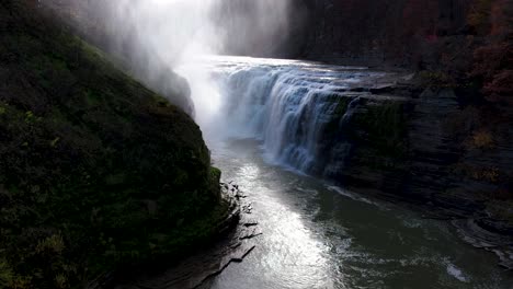 drone footage 4k of waterfallgetting close to the water in an afternoon