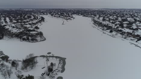 Aerial-video-of-Lake-Lewisville-over-sunset-point-park-in-Texas-frozen-on-2-17-2021