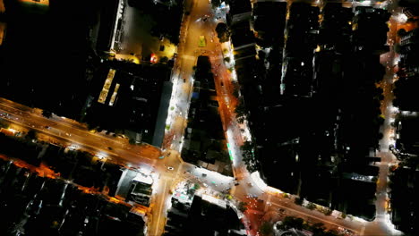capture a top-down timelapse of urban rush hour at night in this stock video. vibrant lights and bustling traffic create a dynamic city pulse