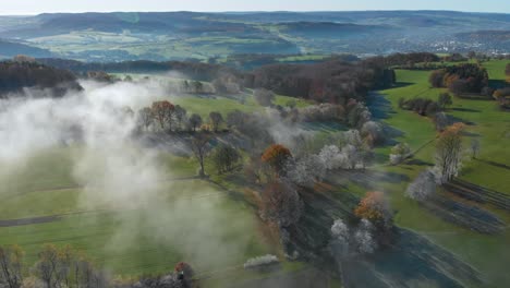 spectacular view over misty lush green valley