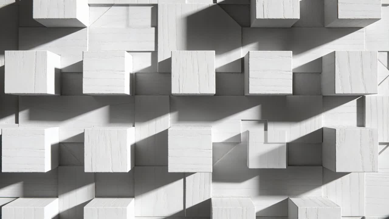 Shifting directional light sweeping across studio wall relief, revealing white wooden cubes grain