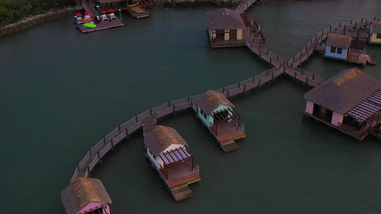 Aerial circling directly above ocean villas resort in Dominican Republic