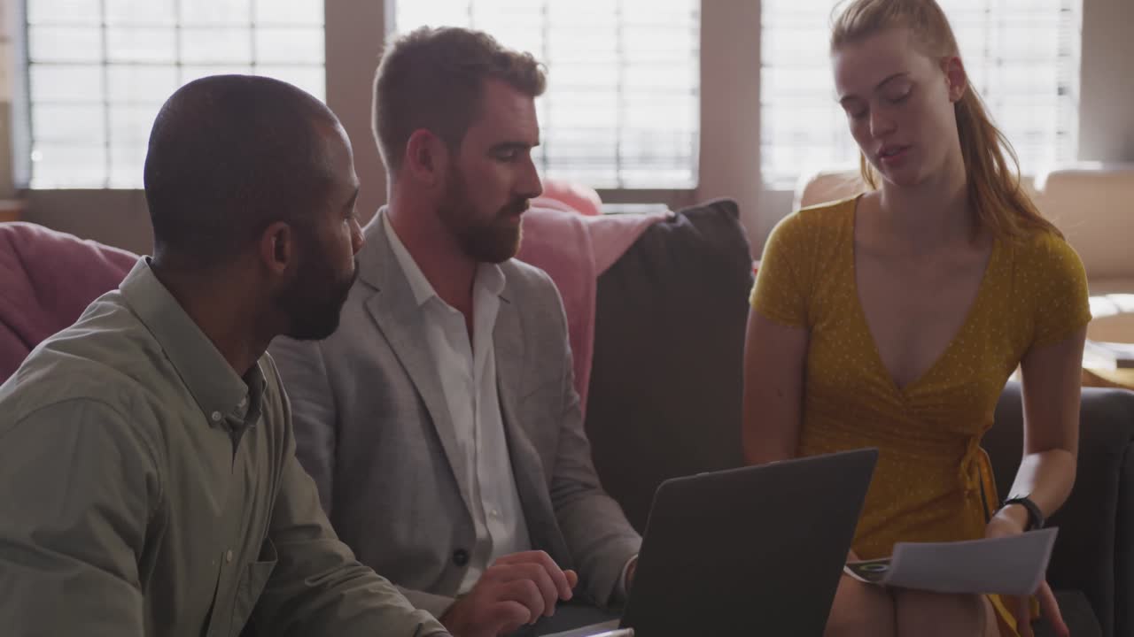 Young creative professionals working in a modern office