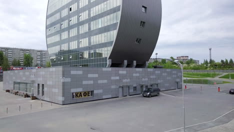 circular building with cafe in a city